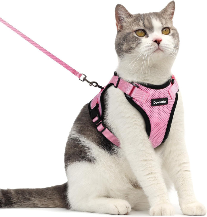Cat Harness and Leash Set, Escape Proof Safe Adjustable Kitten Vest Harnesses for Walking, Easy Control Soft Breathable Mesh Jacket with Reflective Strips for Cats, Pink, XS